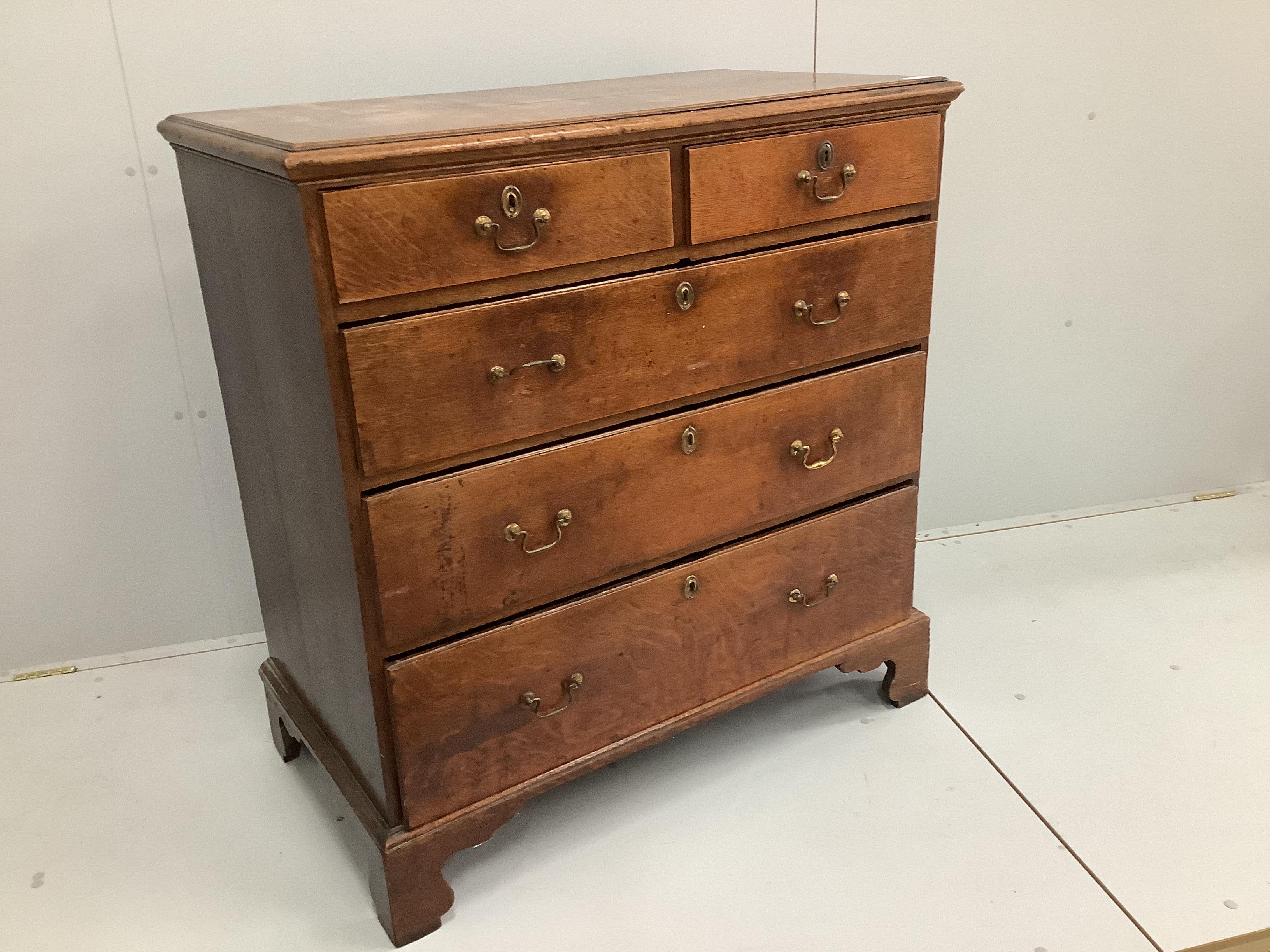 A George III oak chest of five drawers, width 100cm, depth 54cm, height 103cm
